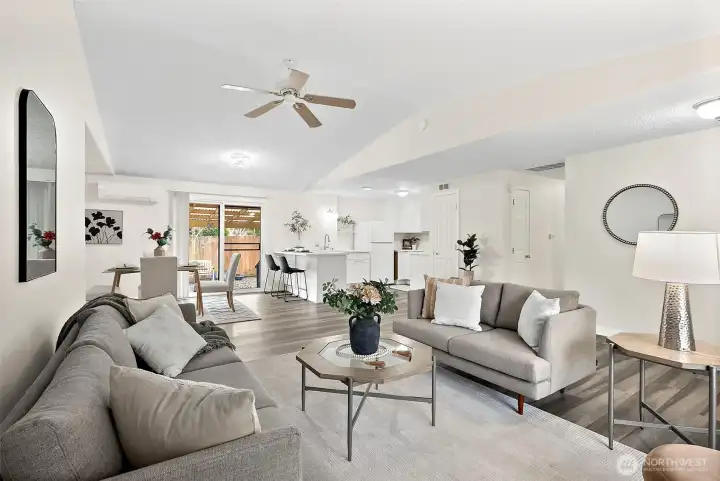 Effortless flow from living to dining to kitchen and out to the backyard. Main living areas features vaulted ceilings, ceiling fans, and mini split.