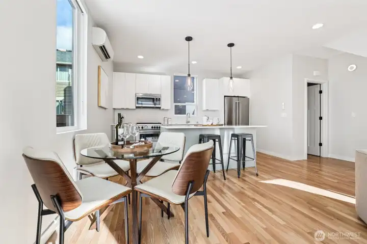 Sip morning coffee and enjoy late night bites with friends in the dining area - there's room for everyone at the table!