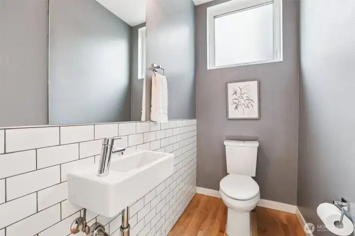 Handy half bath on the main level.