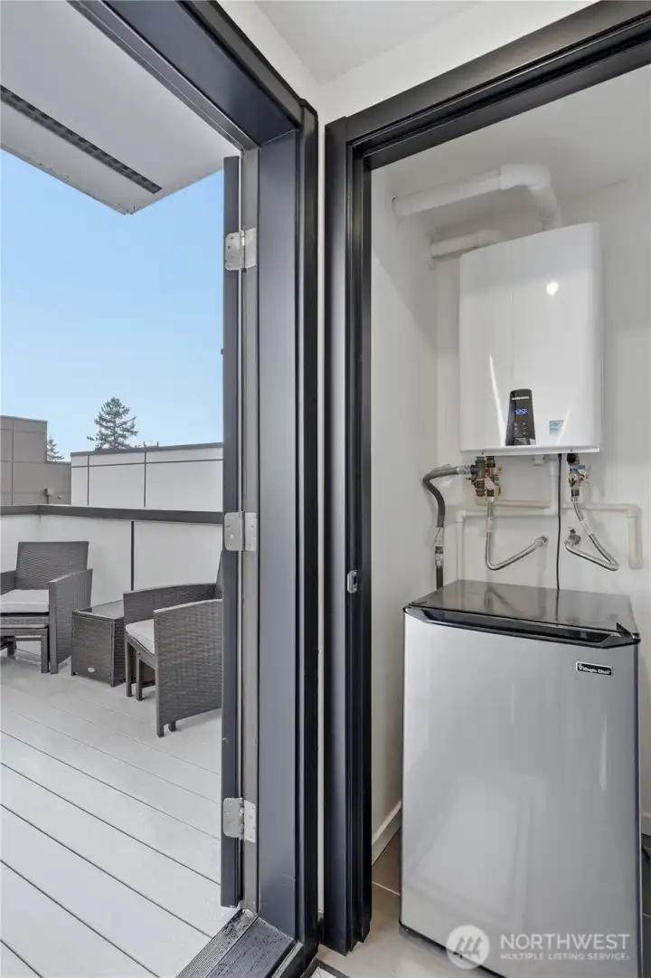 Tankless water heater and beverage fridge top floor