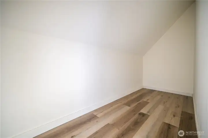 View of finished storage/play area off bunk room.