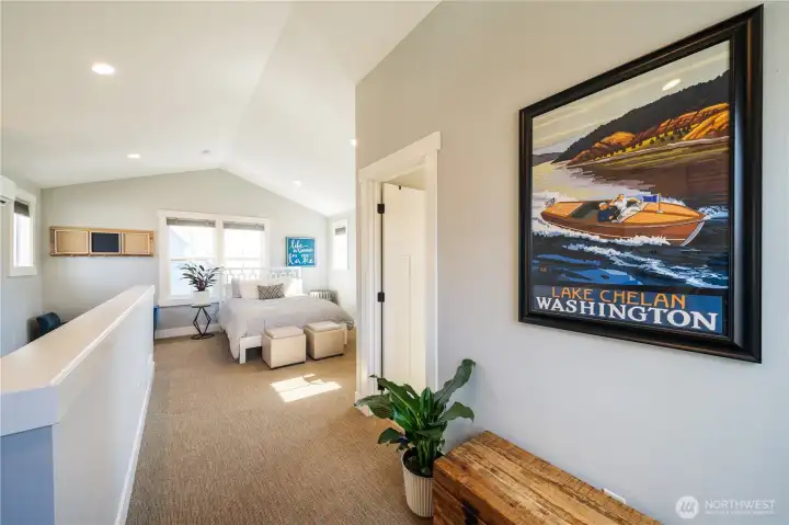 Interior view 2 of upper level 1 bedroom 3/4 bath carriage house with kitchette and living space.