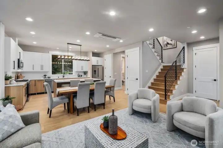 Expansive windows that bathe the interiors in abundant natural light.