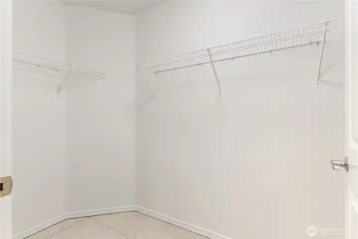 Primary walk in closet.