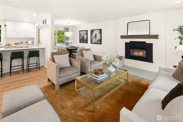 Open concept living/dining/kitchen w/beautiful oak-colored flooring & recessed lighting