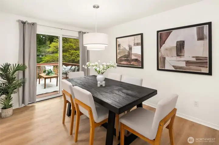 Open concept living/dining/kitchen w/beautiful oak-colored flooring & recessed lighting