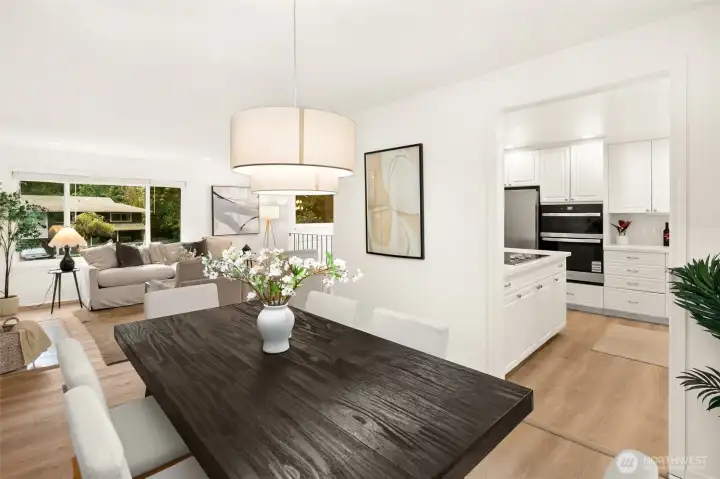 Open concept living/dining/kitchen w/beautiful oak-colored flooring & recessed lighting