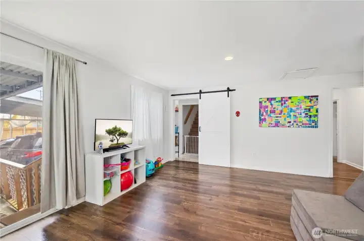 Bonus/PlayRoom outside of Primary Barndoor leading to laundry