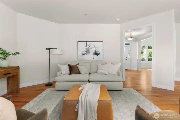 Comfortable living area centered around a stone fireplace, offering a warm setting for gathering.
