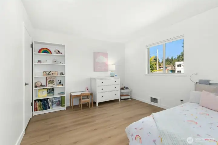 Second bedroom with large walk-in closet. Second bedroom with large walk-in closet.