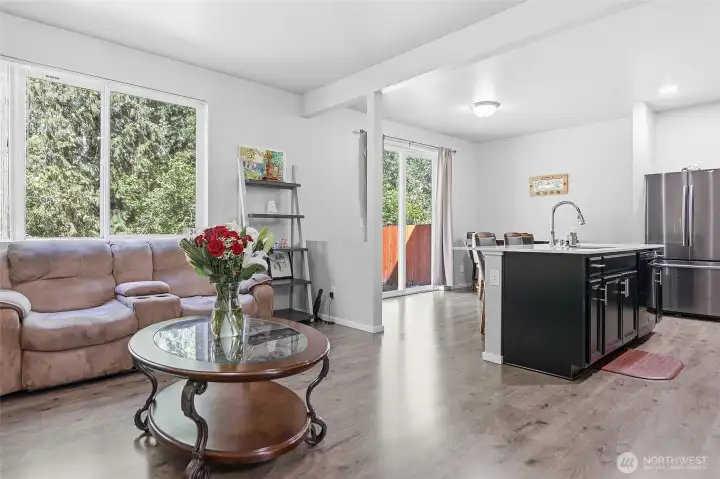 Great room, steps to back yard