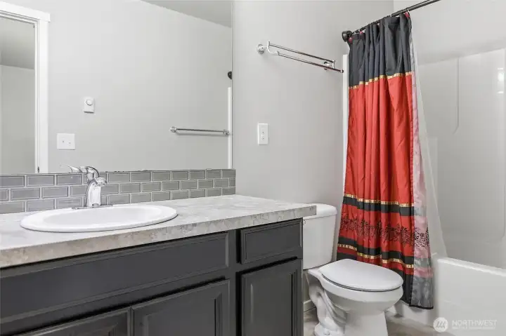 Additional bath, upper level.