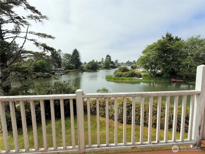 Primary has access to the deck with a beautiful view of the canal.
