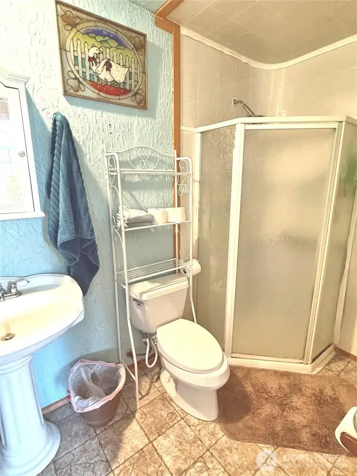 Guest bathroom (even a urinal) on second level.