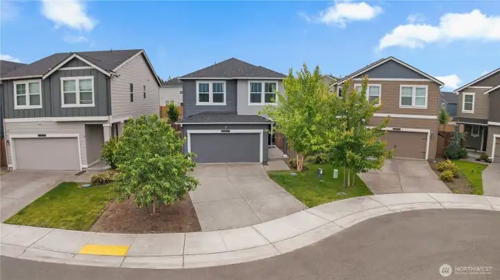 Move-in ready 4-bedroom home in Puyallup featuring contemporary design and low-maintenance landscaping.