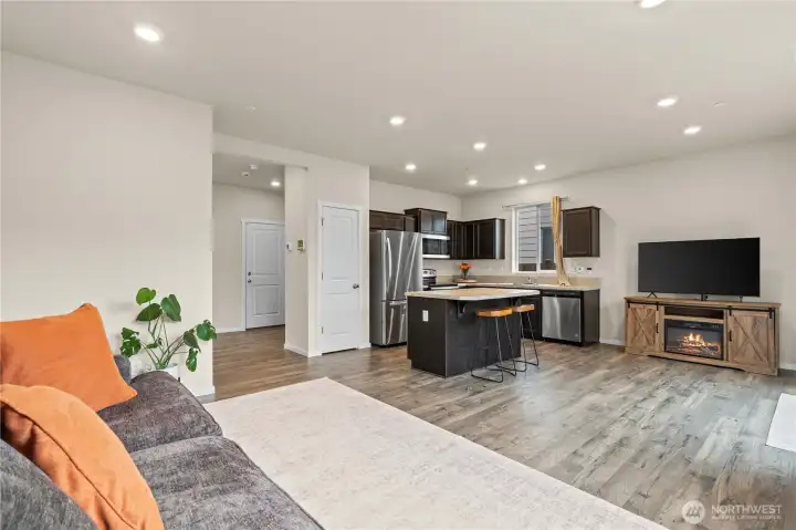 Open-concept living area filled with natural light and designed for everyday living and entertaining.