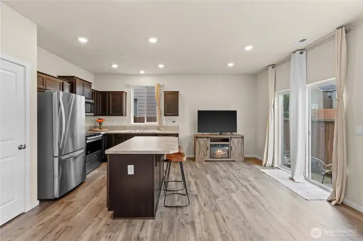 Updated kitchen overlooks the main living area, ideal for entertaining guests.
