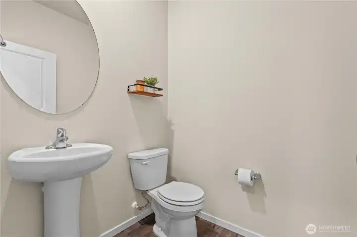 Convenient main floor half bath for guests and everyday use.