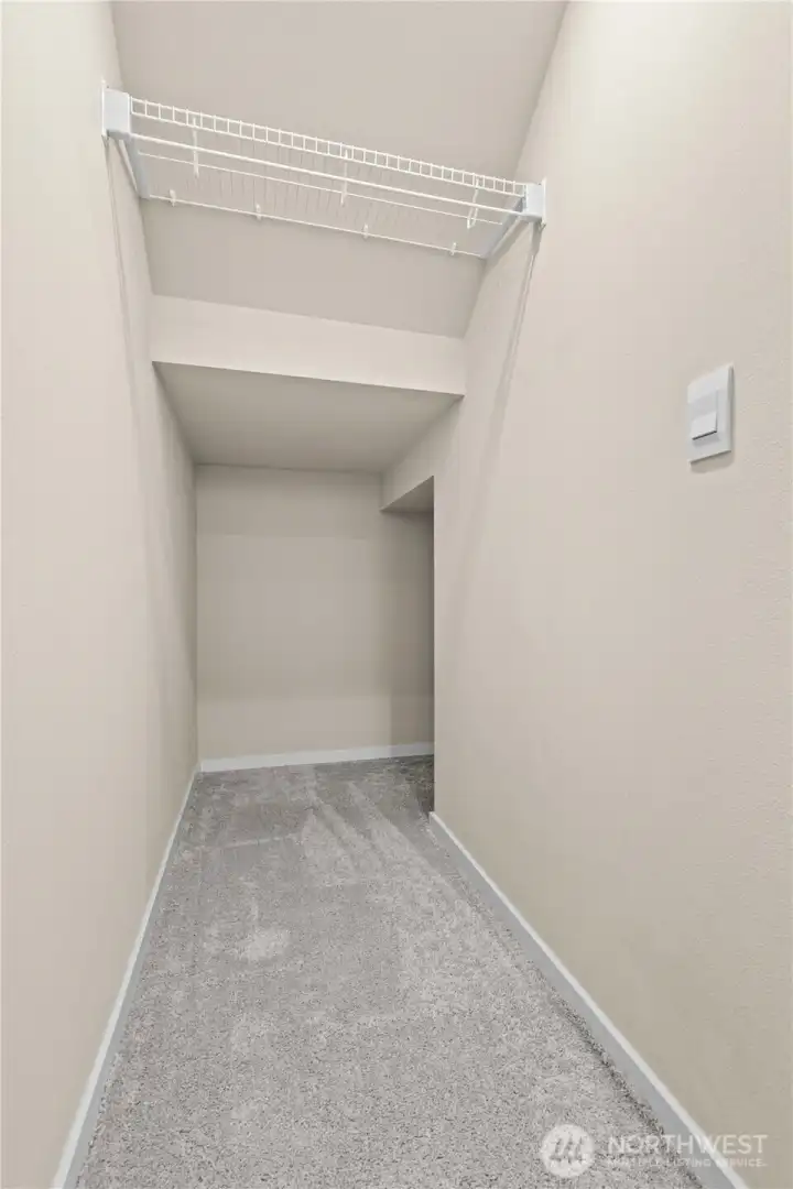 Additional storage space provides room for organization and household essentials.