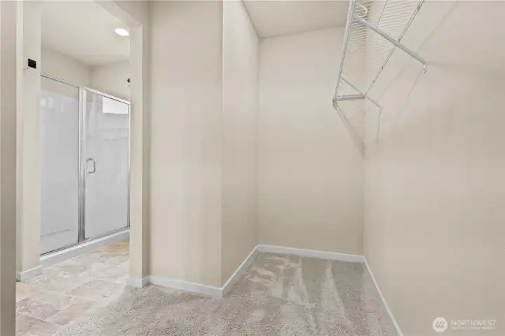 Spacious primary bathroom with functional layout and everyday convenience.