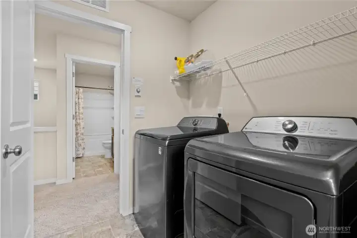 Convenient upstairs laundry room located near all bedrooms for maximum functionality and everyday ease.