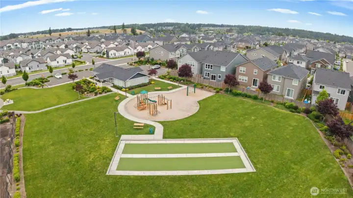Community recreation area featuring open green space and neighborhood gathering areas.