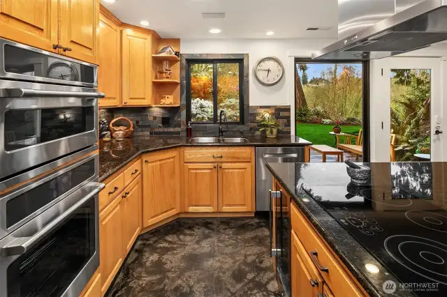 Cafe' brand oven, refrigerator and microwave were put in just last year. The French door off the kitchen leads to an incredible surprise!
