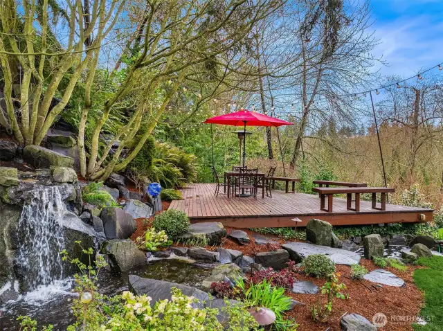 The property backs up to Salmon Creek Ravine, offering incredible privacy and connecting you to the urban forest.
