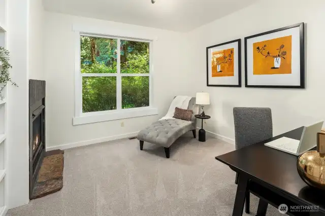 Main Floor Den with a Gas Fireplace