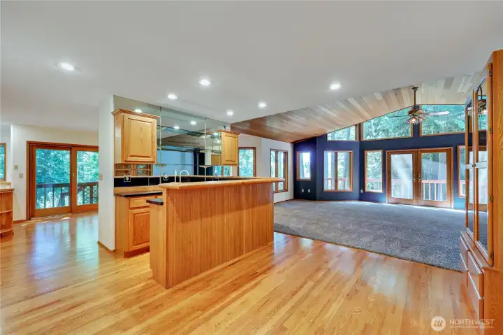 Entering the home you'll see the gleaming hardwood floors and the fun wet bar.  Hosting would be a dream in this home.