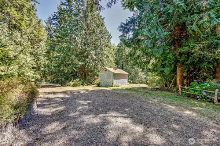 Storage shed and wood shed (behind storage shed, not pictured).