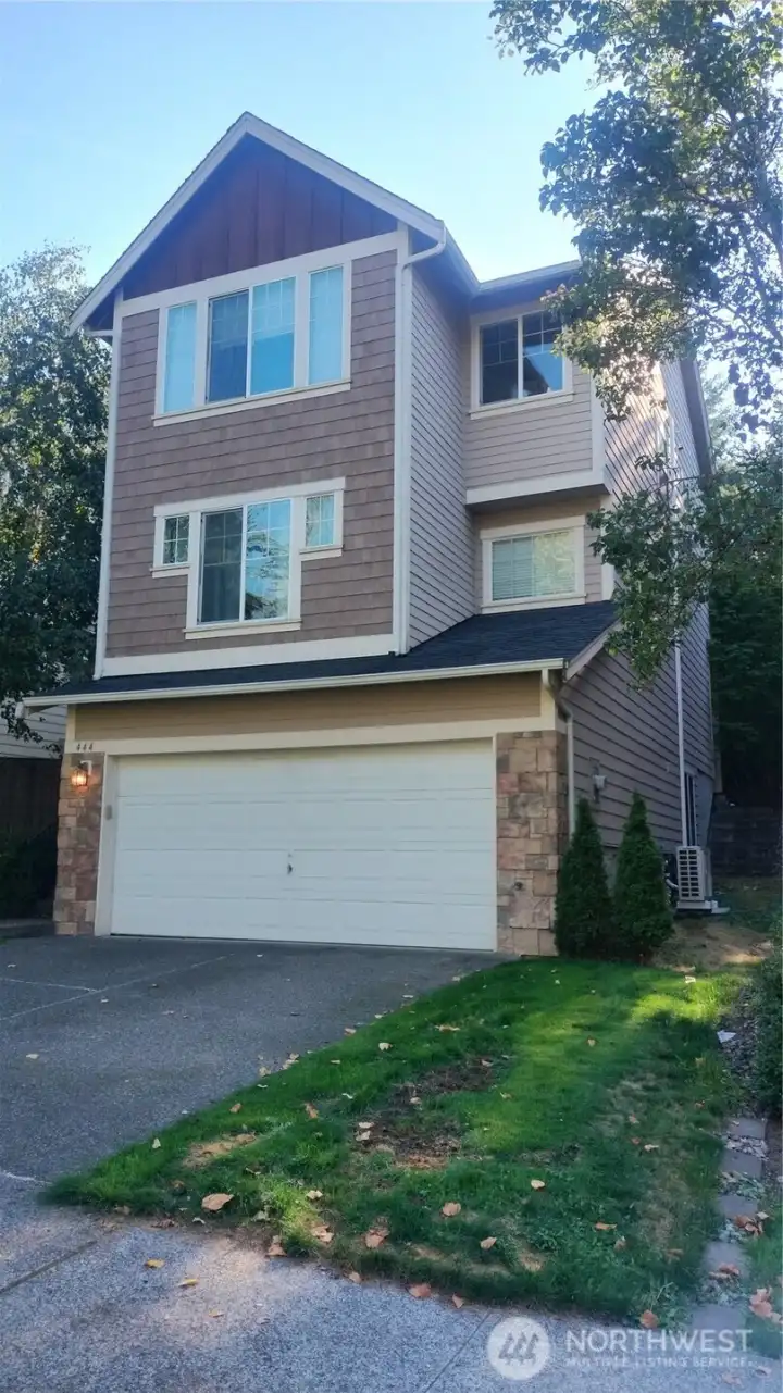 The home has a two car garage that leads onto the ground level with hallway to full bathroom, storage closet and 4th bedroom with is a rec room sized room with two windows and quadruple wide closets!