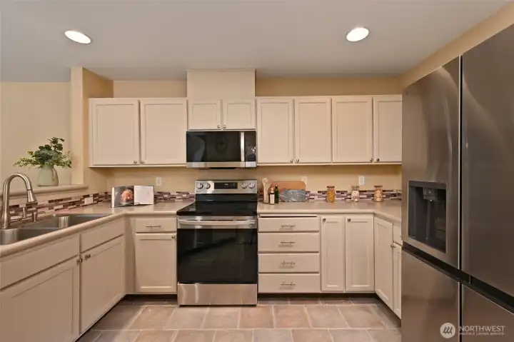 Freshly painted with new hardware and a suite of stainless-steel appliances.