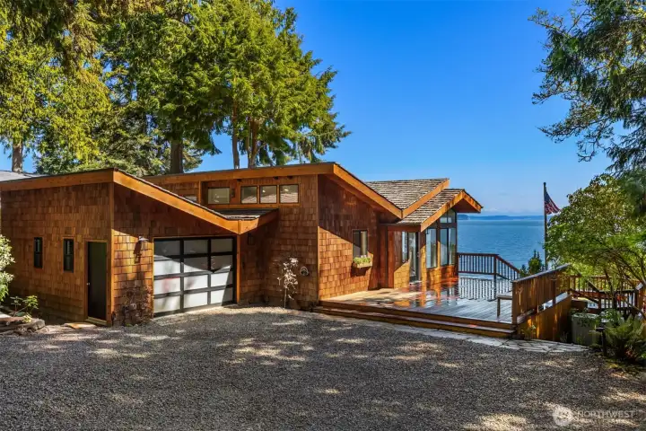 Stunning architectural design with spacious attached garage.