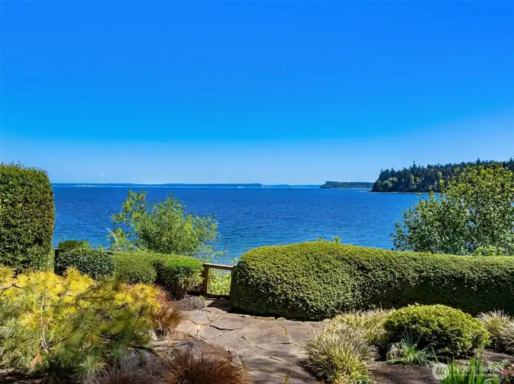 Manicured landscaping and sweeping views of Puget Sound.