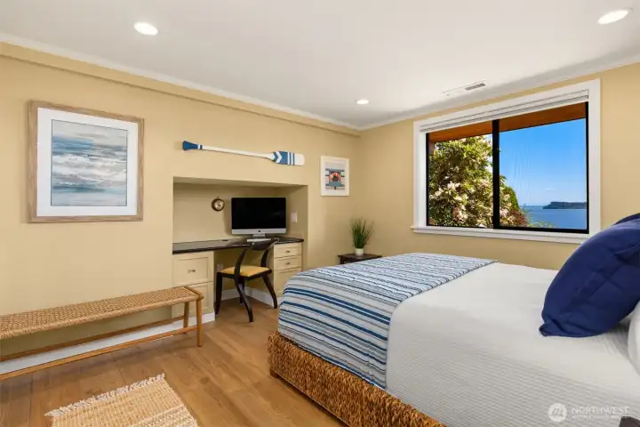 Lower level bedroom with office nook.