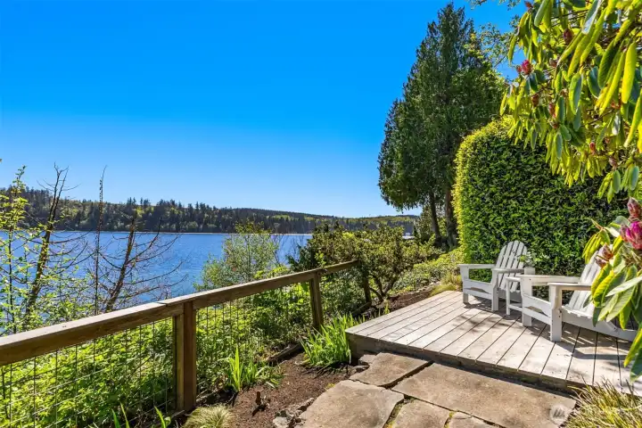 Meander through the manicured garden to another sun-filled sitting area.