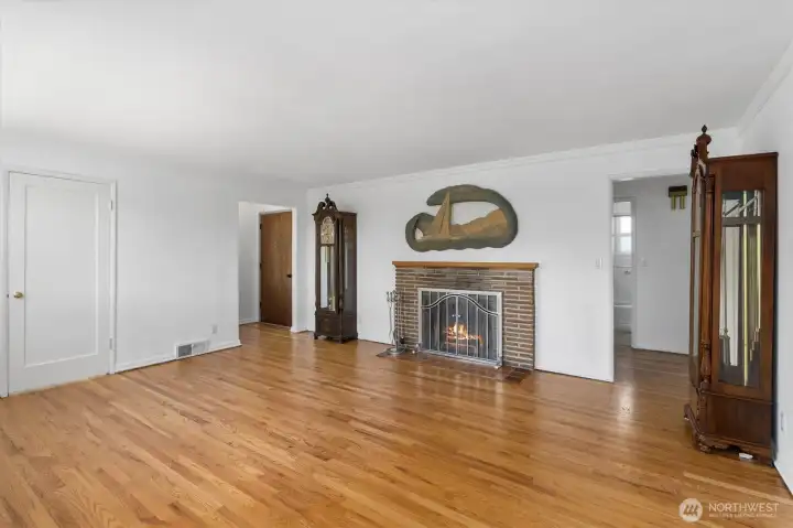 Living room area with wood fireplace