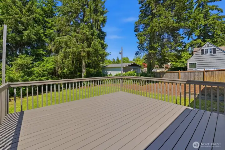 Freshly painted deck-sliding glass door from living room to backyard.