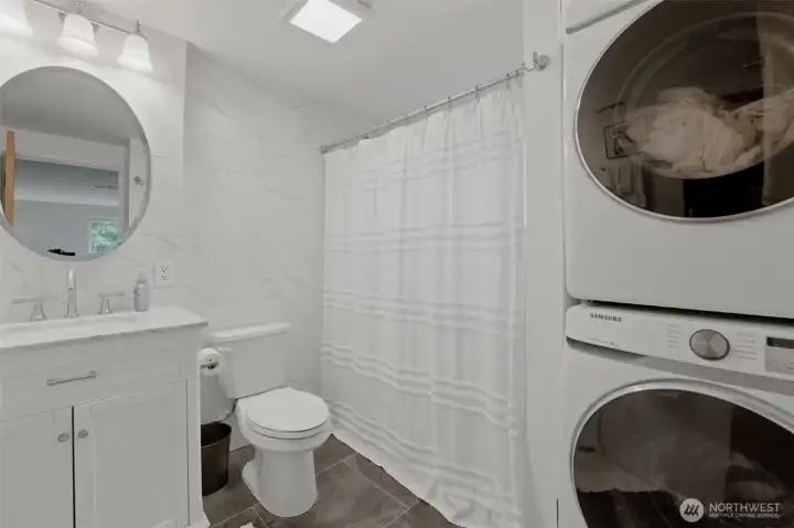 Primary bathroom with laundry