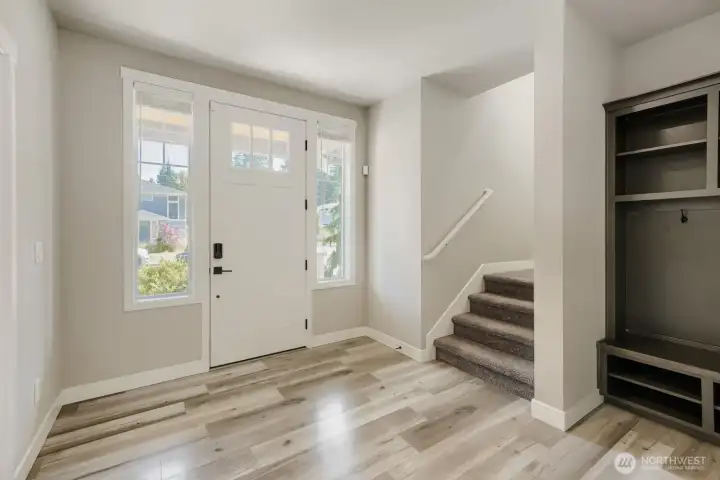 Bright and inviting entry welcomes you with modern flooring, abundant natural light, and a functional layout. Bright and inviting entry welcomes you with modern flooring, abundant natural light, and a functional layout.