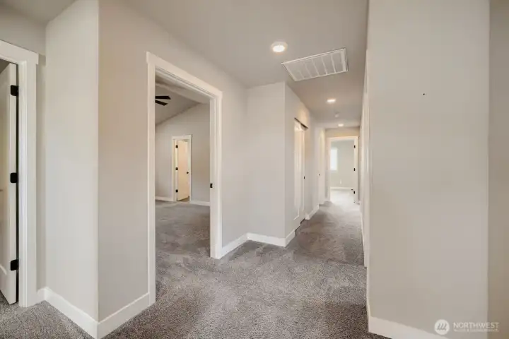 Wide hallways and thoughtful design create an open, comfortable feel throughout the home. Wide hallways and thoughtful design create an open, comfortable feel throughout the home.