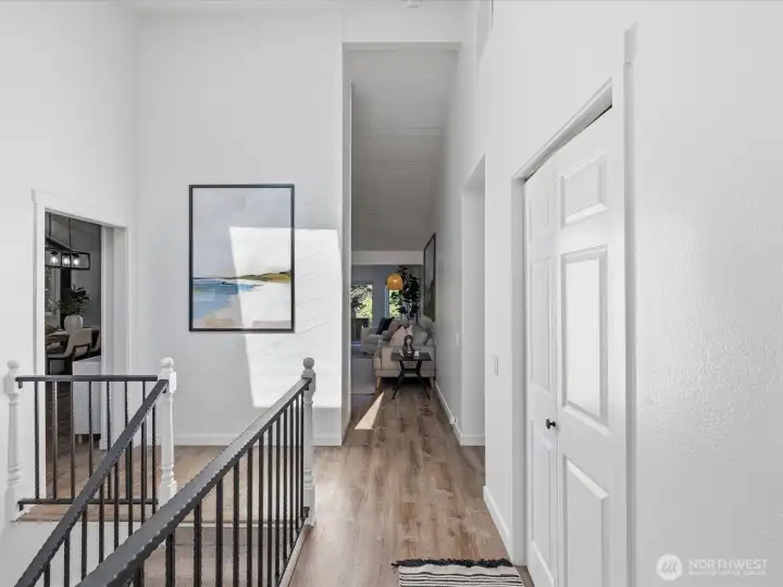Inviting front entry with access to the open floor plan.