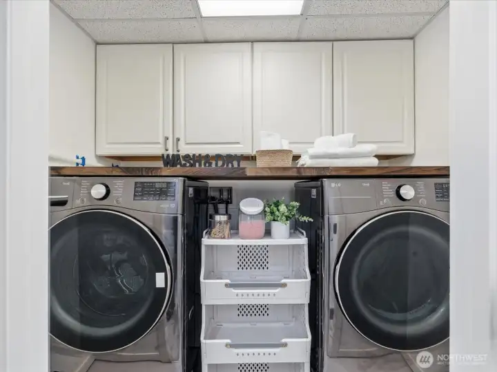 Laundry with plenty of storage and countertop use