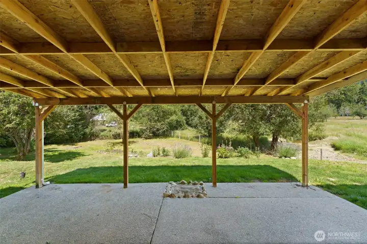 Large covered back patio for year round enjoyment. Large covered back patio for year round enjoyment.