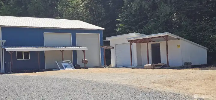 Shop, storage shed and wood shed