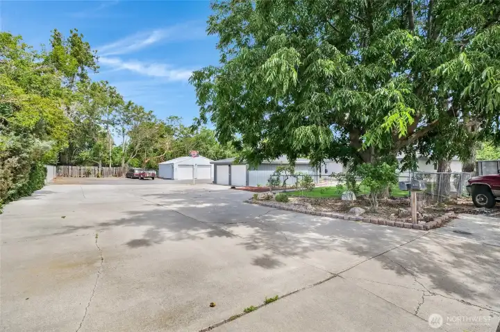 Need a place to park? We have plenty of room! This driveway allows for multiple vehicles as well as an easement for the far neighbor to access their property.