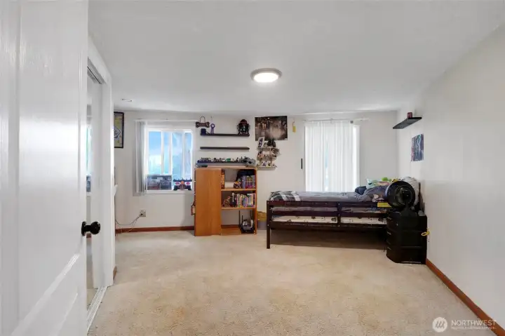 Bedroom #3 is very spacious and has a lot of natural light coming in with having two windows!