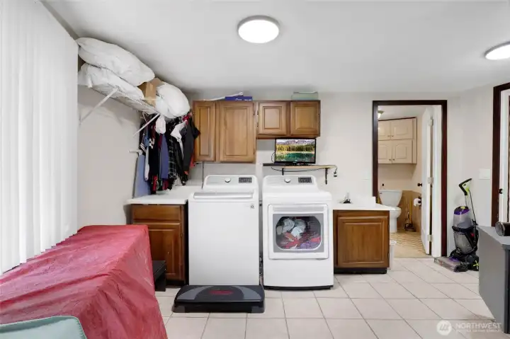 The laundry/utility room is the first room to the left upstairs.