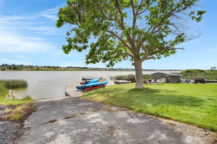 Your private boat launch awaits! You can access the whole lake from this property! Or just hang out on your dock or at the firepit down here.